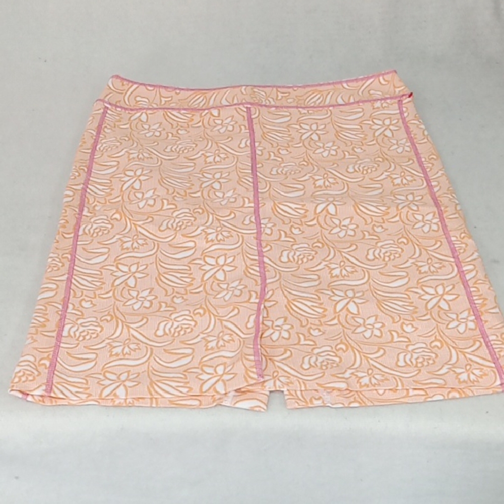 Vibrant Orange and Pink Lace Skorts with Floral Elegance
